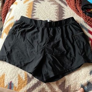 Beach Diva lined swim shorts with zippered pockets